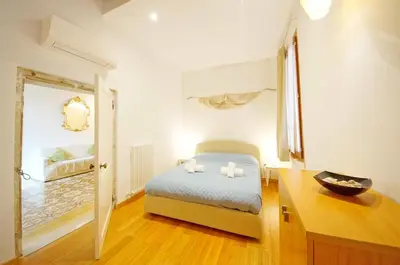 Letto o letti in una camera di DolceVita Apartments N 499 Biennale