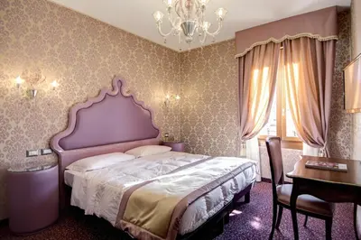 Letto o letti in una camera di Domus Cavanis