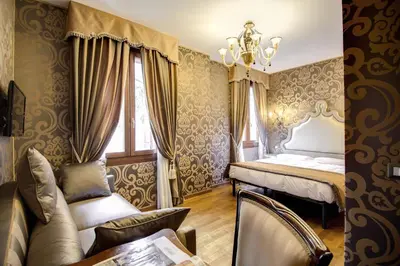 Letto o letti in una camera di Domus Cavanis