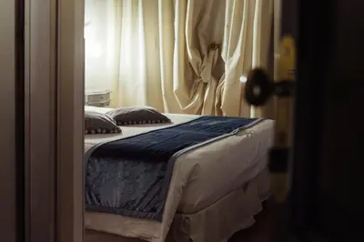 Letto o letti in una camera di Villa Gasparini