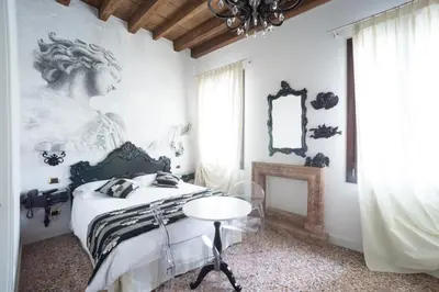 Letto o letti in una camera di Villa Gasparini