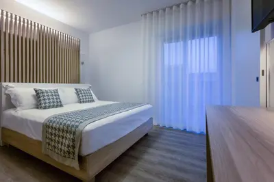 Letto o letti in una camera di Hotel Jet