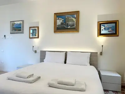 Letto o letti in una camera di Ca' D'Agostino