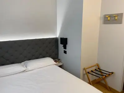 Letto o letti in una camera di Park Hotel Villa Giustinian