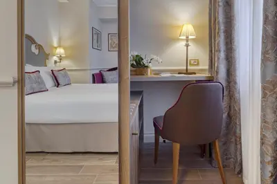 Letto o letti in una camera di Hotel Nuovo Teson