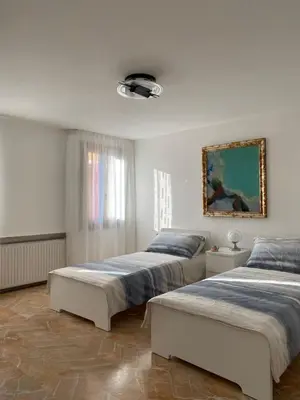Letto o letti in una camera di Casa di Angela