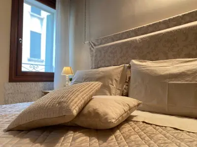 Letto o letti in una camera di Lovely Venice