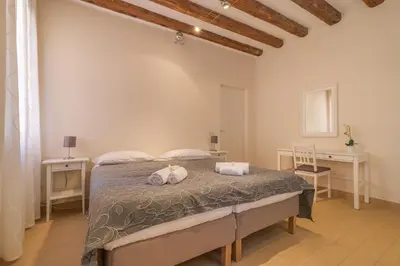 Letto o letti in una camera di Casa Masa close to @S.Lucia Train Station