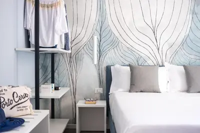 Letto o letti in una camera di Residence Lido di Dante