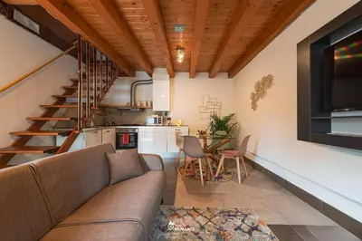 Area soggiorno di RIVA House by Sleep in MURANO
