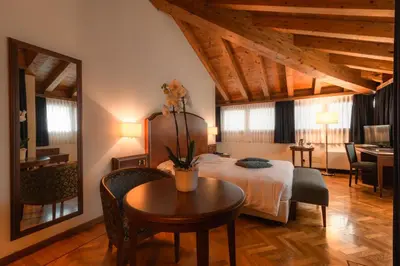Letto o letti in una camera di Hotel Alla Torre
