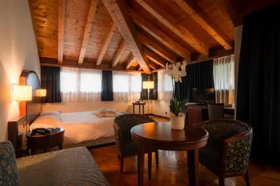 Letto o letti in una camera di Hotel Alla Torre