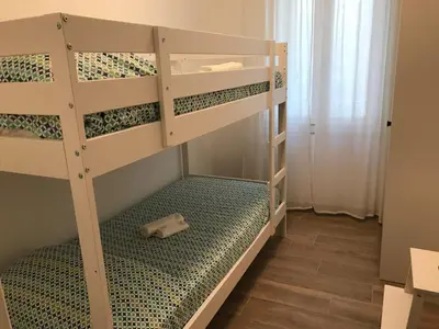Letto o letti in una camera di Chioggia House di Marco