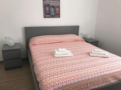 Letto o letti in una camera di Chioggia House di Davide