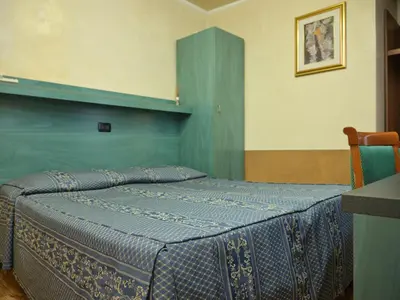Letto o letti in una camera di Atlantide Hotel