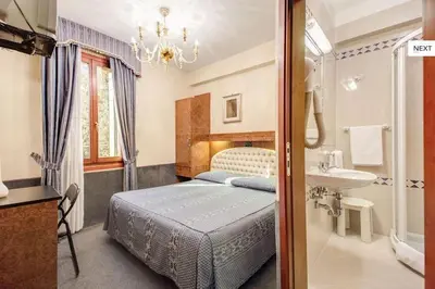 Letto o letti in una camera di Atlantide Hotel