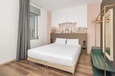 Letto o letti in una camera di B&B HOTEL Treviso Al Fogher