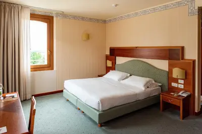 Letto o letti in una camera di Phi Hotel Astoria