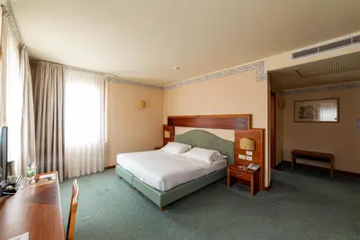 Letto o letti in una camera di Phi Hotel Astoria