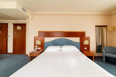Letto o letti in una camera di Phi Hotel Astoria