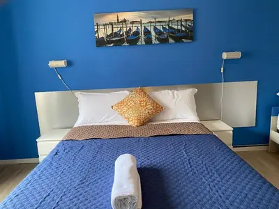 Letto o letti in una camera di Venice Stay