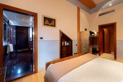 Letto o letti in una camera di Ca' Pisani Hotel