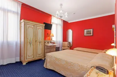 Letto o letti in una camera di Hotel Malibran