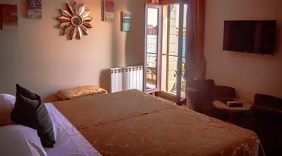 Letto o letti in una camera di Hotel La Calcina