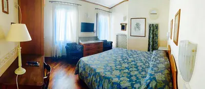 Letto o letti in una camera di Hotel La Calcina