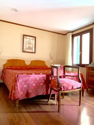 Letto o letti in una camera di Hotel La Calcina