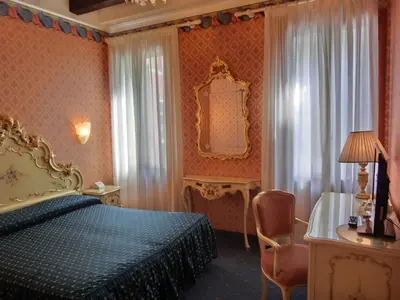 Letto o letti in una camera di Hotel Diana