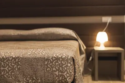 Letto o letti in una camera di Foresteria Levi
