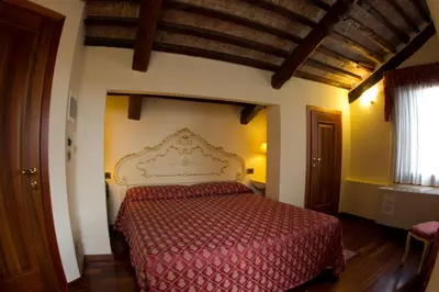 Letto o letti in una camera di Locanda Poste Vecie
