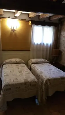 Letto o letti in una camera di Ca' Rielo