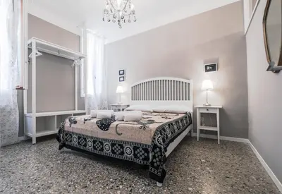 Letto o letti in una camera di Appartamento Ai Greci Residenza Quaggio