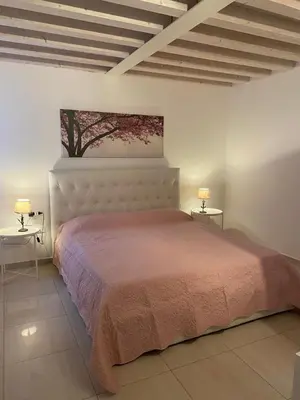 Letto o letti in una camera di Ca' Contadin