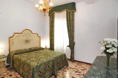 Letto o letti in una camera di Smeraldo apartment Grand Canal 1566C