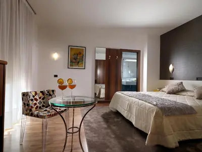 Letto o letti in una camera di Hotel Al Pino Verde