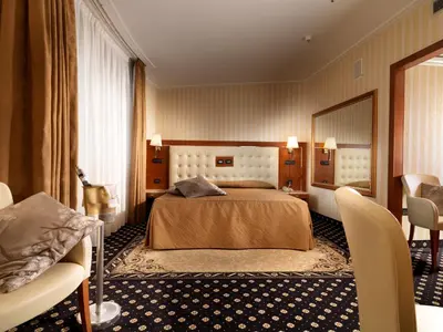 Letto o letti in una camera di Hotel Ariston
