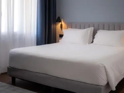Letto o letti in una camera di The Foscarini