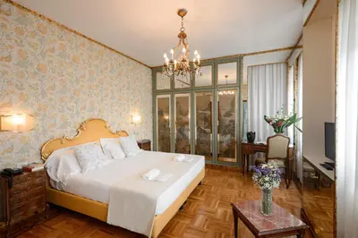 Letto o letti in una camera di Hotel Continental