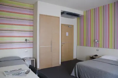 Letto o letti in una camera di Key Hotel