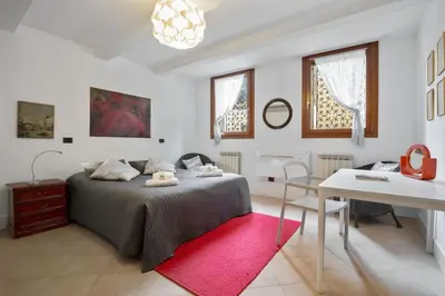 Letto o letti in una camera di Riva Di Biasio & Sestiere Santa Croce x4