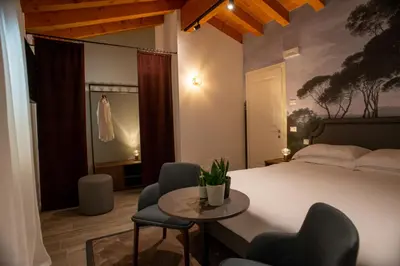 Letto o letti in una camera di Relais La Dolce Vite