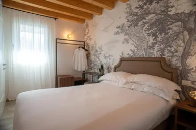 Letto o letti in una camera di Relais La Dolce Vite
