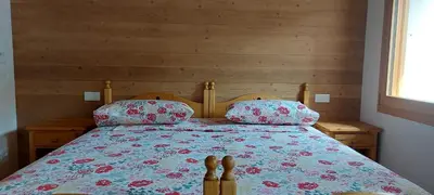 Letto o letti in una camera di Agriturismo l'Eremo