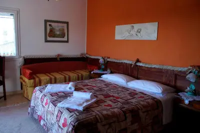 Letto o letti in una camera di Red Fenice