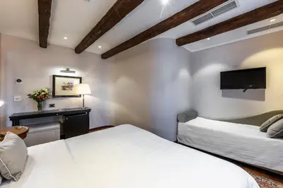 Letto o letti in una camera di Hotel Casa Verardo Residenza d'Epoca