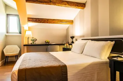 Letto o letti in una camera di Hotel Grande Italia