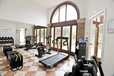 Palestra o centro fitness di Maison Boutique Al Redentore